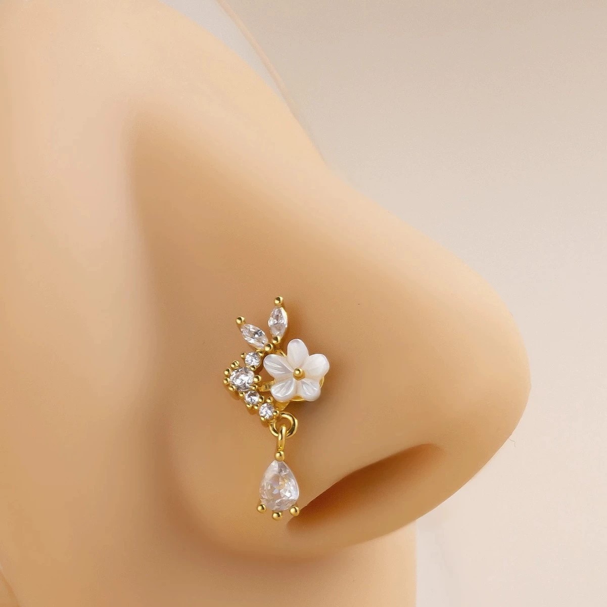 Goldener Blumen-Nasenring mit  – Body Jewelry Surgical Steel Bewertung und Preis